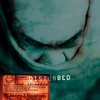 Kép 2/2 - DISTURBED - THE SICKNESS (1LP, 25TH ANNIVERSARY EDITION, LIMITED GREEN COLOURED VINYL)